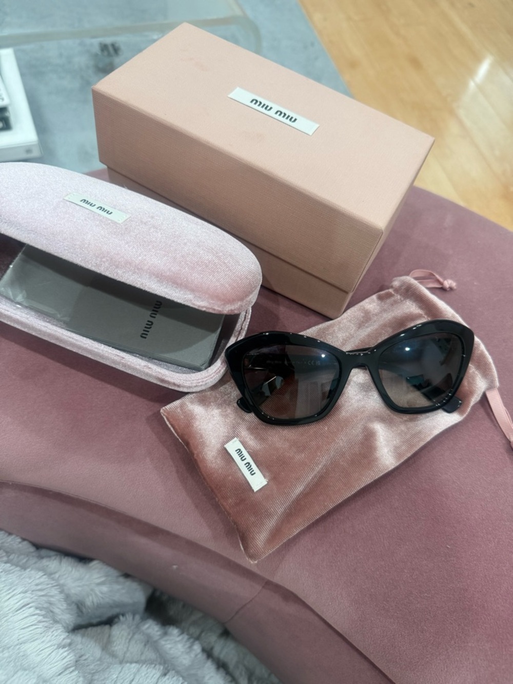 Miu Miu Black Cat-Eye Sunglasses with Dark Lenses